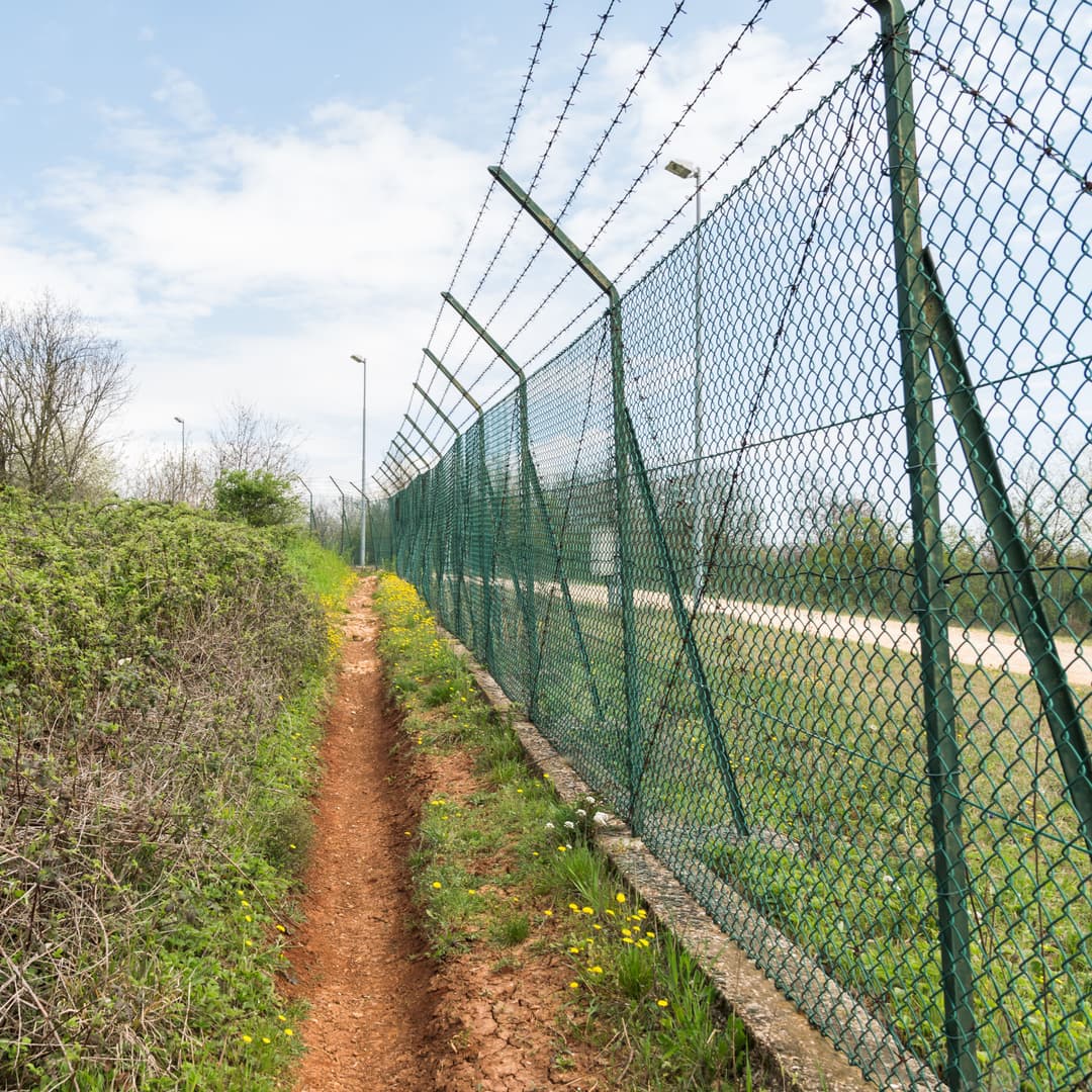 fence-field-against-sky.jpg