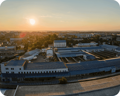 Rooftop solar panels at sunset